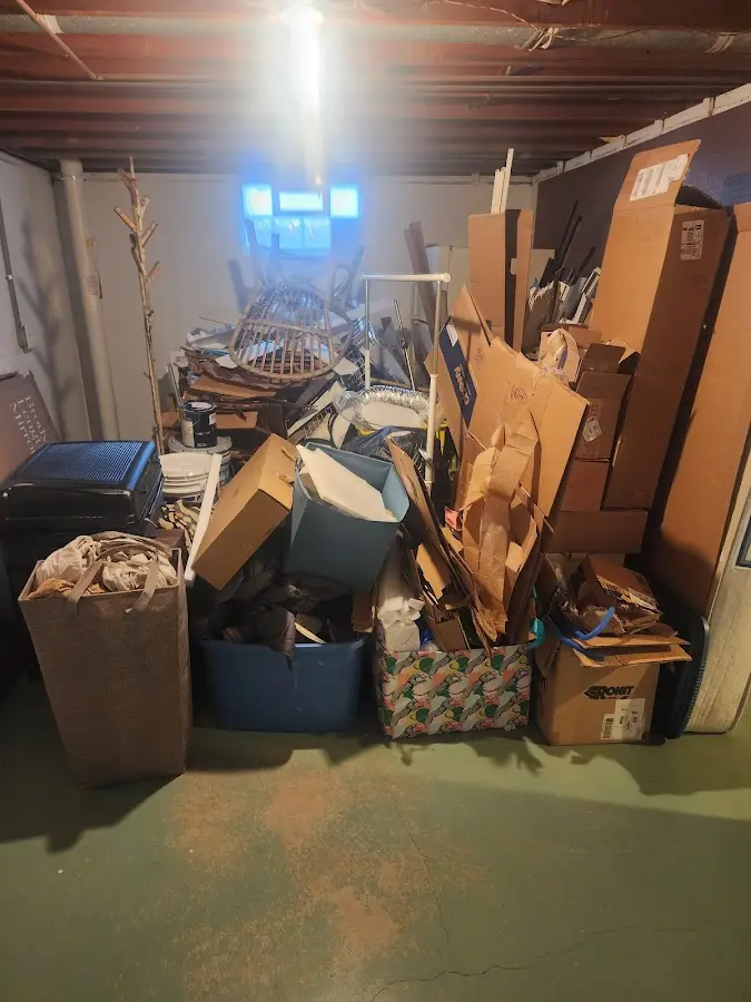 Roll-off dumpster container at job site for 15 Yard Dumpster Rental in Charlestown